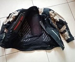 Klim Badlands Pro suit.