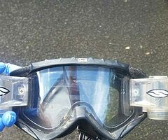 Scott motocross goggles and roll offs.