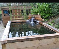 Wooden pond for koi and goldfish. 
 
Won't be beaten on price call for a quote