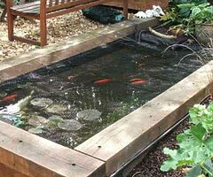 Wooden pond for koi and goldfish. 
 
Won't be beaten on price call for a quote