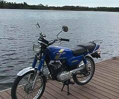 Ax 100