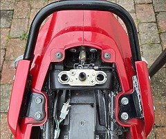 I need a top box bracket for a suzuki slingshot 125