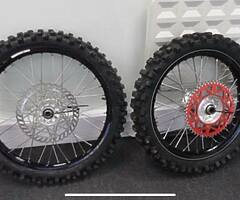 Looking for a set of 2010 honda wheel has to be black or any other year that may fit