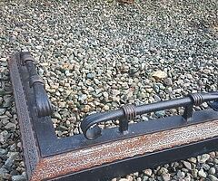 Cast iron fireplace defender