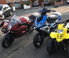 125 QUAD TWIN EXHUST