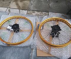 2007 CR250 OEM silver wheels.