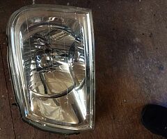 Mitsubishi L200 passenger side headlight