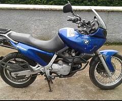 Bmw f650 or aprilia pegaso looking