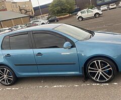 Need black side skirts and front splitter for mk5 golf