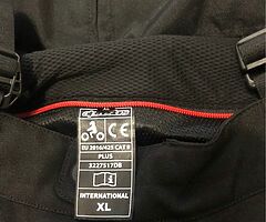Alpinestars motorcycle waterproof jacket and Alpinestars motorcycle waterproof trousers.
