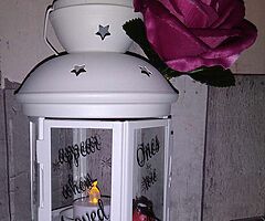Lanterns and terracotta pots "robins appear when loved ones loved"