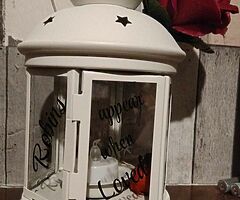 Lanterns and terracotta pots "robins appear when loved ones loved"