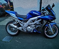Sv1000 exhaust swap
