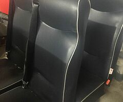 Crew cab van seat with belts