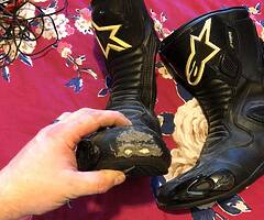 Leathers, boots, paddock stands