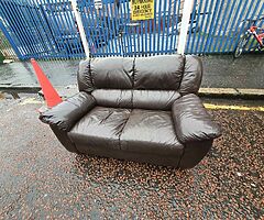 2 seater sofa in a brown leather hyde
