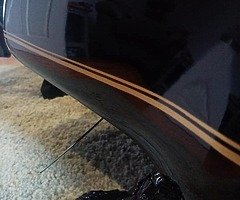 Pinstriping, lettering, gold leafing.