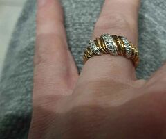 24   Carrat Gold real diamond ring worth over 100O