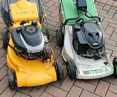 2 petrol lawn mowers needing tlc note these where dear machines when new won't take much to get goin