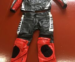 two piece leathers, boots and gloves
