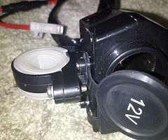 Motorcycle handlebar mounted phone charger