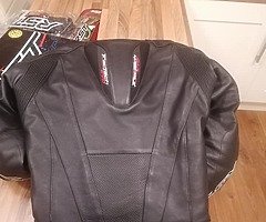Various motorbike leathers and boots