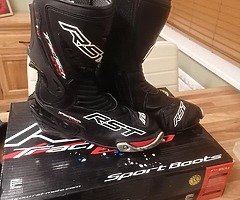 Various motorbike leathers and boots