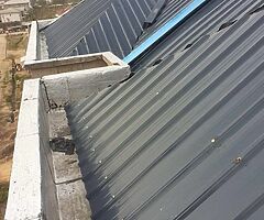 Realisation of building projects and supply of roofing materials