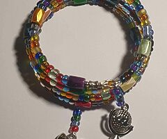 Various motorbike related charms, jewellery and bookmarks