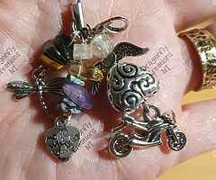 Various motorbike related charms, jewellery and bookmarks