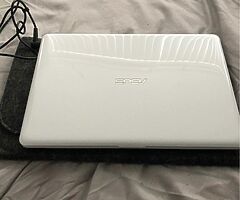 White ASUS laptop