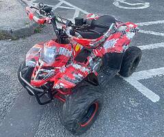 125 4/ Racing quad￼