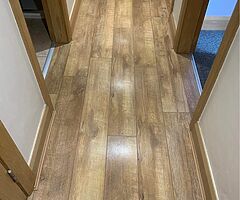 Oak effect laminate flooring. Approx 35 m2.