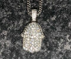 White gold chain with diamond hamza pendant bought in New York