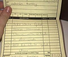 White gold chain with diamond hamza pendant bought in New York