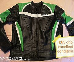 motorcycle green black jacket