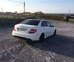 **White 2012 Mercedes-Benz C Class**