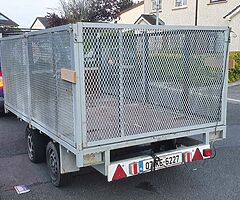 Twin axle trailer with cage