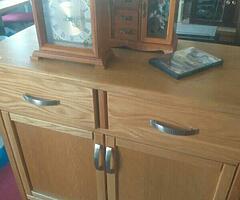 sideboard units, 40" smart Tv, baby chair, drawers