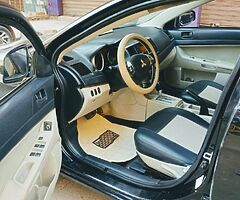 ميتسوبيشى لانسر شارك ٢٠١٣ الفئه الثانيه ماشيه ١٢٥ الف رخصه سنه ونص فابريكا انا اول مالك - Image 3/9