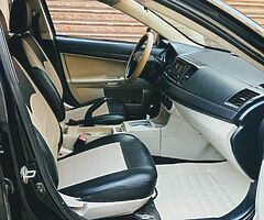 ميتسوبيشى لانسر شارك ٢٠١٣ الفئه الثانيه ماشيه ١٢٥ الف رخصه سنه ونص فابريكا انا اول مالك - Image 7/9