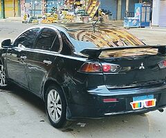 ميتسوبيشى لانسر شارك ٢٠١٣ الفئه الثانيه ماشيه ١٢٥ الف رخصه سنه ونص فابريكا انا اول مالك - Image 8/9
