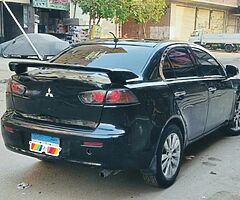 ميتسوبيشى لانسر شارك ٢٠١٣ الفئه الثانيه ماشيه ١٢٥ الف رخصه سنه ونص فابريكا انا اول مالك - Image 9/9