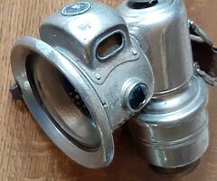This is a Used P&H  Vintage Acetylene Carbide Motor Cycle Lamp or Antique Bicycle lamp.