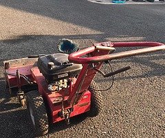 Petrol powered sweeper and collected