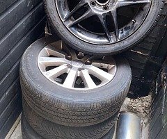 3 silver Honda Civic ep2 sport alloys. 1 black Honda Accord type R alloy (no center cap)