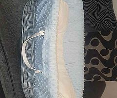 Grey wicker moses basket