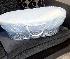 Grey wicker moses basket