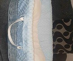 Grey wicker moses basket