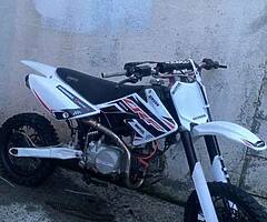 Stomp 140cc twin pipe